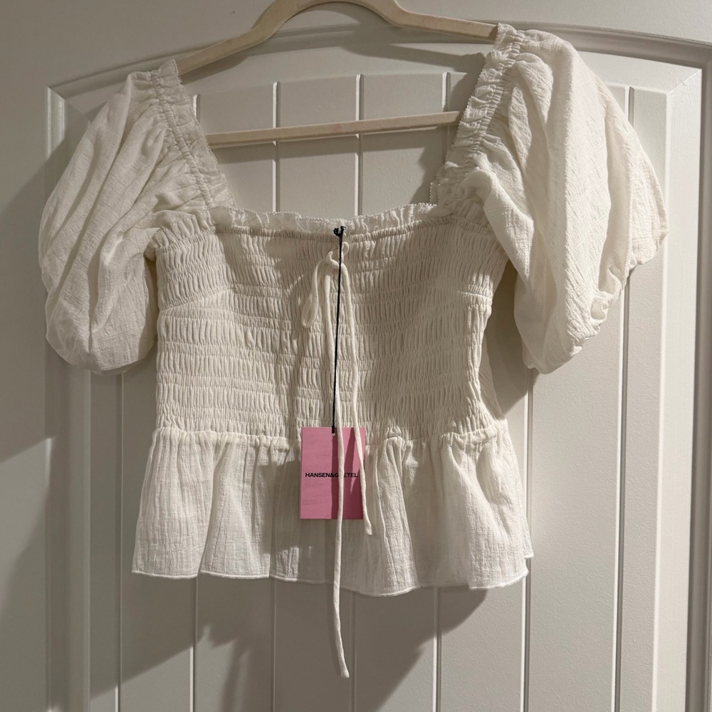 Hansen & Gretal Ivory Smocked Peplum Puff Sleeve Top